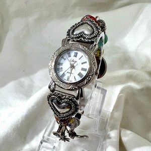 Vintage Charm Bracelet Made Using 925 Sterling Silver Charms New Batteries.